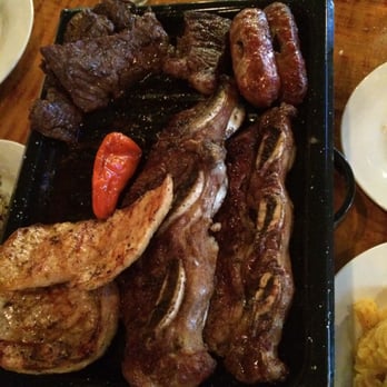 Choripan Rodizio Too - Platter for 2 minus one piece of meat that mom couldn't wait to eat. - Barbeque Near Me - Hackensack, New Jersey Choripan Rodizio Too - Platter for 2 minus one piece of meat that mom couldn't wait to eat. - Barbeque Near Me - Hackensack, New Jersey