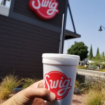 Swig - a hand holding a cup of coffee - Desserts Near Me - St. George, Utah