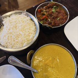 Chicken Korma, lamb curry, and rice Chicken Korma, lamb curry, and rice