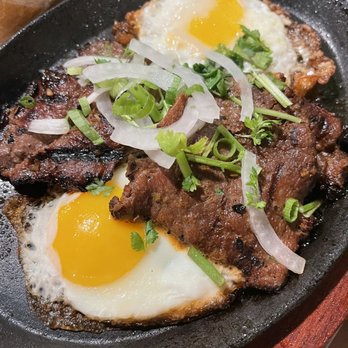 Pho Ca Dao Grill - Sizzling Ribeye & Egg / Bánh Mì Bò Né & Trứng ($14). July 2021 - Vietnamese Near Me - Escondido, California Pho Ca Dao Grill - Sizzling Ribeye & Egg / Bánh Mì Bò Né & Trứng ($14). July 2021 - Vietnamese Near Me - Escondido, California