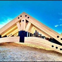 Specialty Wood Products - SWP supplies beautiful custom glulam timber truss systems and install hardware.