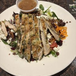 The Lodge Bar & Grill - Salad special with mixed greens, goat cheese , walnuts and grilled chicken
