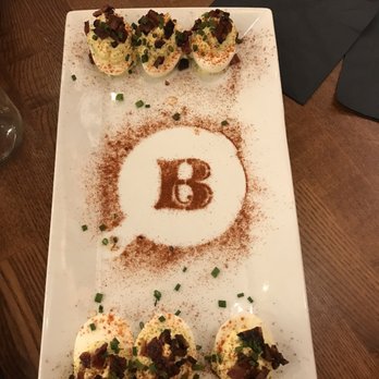 Batch Local Kitchen - Appetizer deviled eggs with bacon on top - Cocktail Bars Near Me - West Palm Beach, Florida