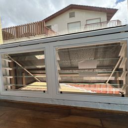 Jalousie under existing fixed pane window (interior trim not yet installed