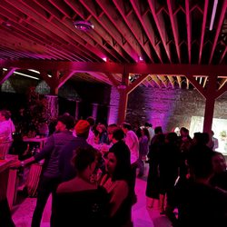 Mytheresa X Flamingo Estate Holiday House - Party guests having a good time.