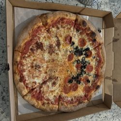 Big Romans Pizza - Pizza with extra toppings. But we didn't get extra toppings we actually got less. But paid for extra