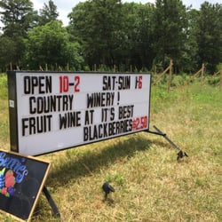 American Way Country Wines - Roadside sign with hours