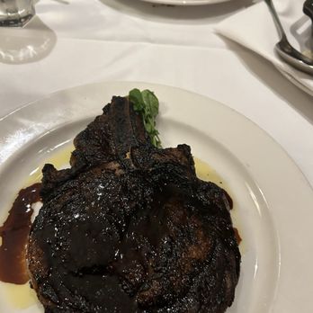 The Capital Grille - Porcini-Rubbed Bone-In Ribeye with 15-Year Aged Balsamic - Steakhouses Near Me - Tampa, Florida The Capital Grille - Porcini-Rubbed Bone-In Ribeye with 15-Year Aged Balsamic - Steakhouses Near Me - Tampa, Florida