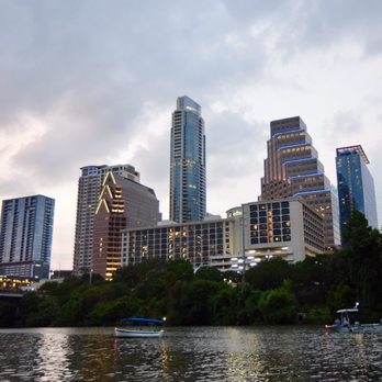 Capital Cruises - City views while waiting for the bats. - Boat Charters Near Me - Austin, Texas
