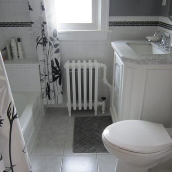 Garn Construction, Inc - a bathroom with a radiator - General Contractors Near Me - Saint Paul, Minnesota Garn Construction, Inc - a bathroom with a radiator - General Contractors Near Me - Saint Paul, Minnesota