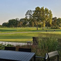 Acorn Grill + Terrace - Terrace seating overlooking the golf course