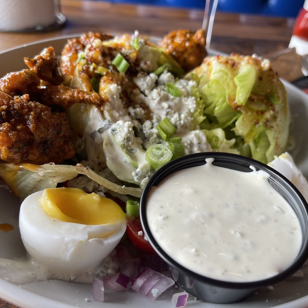 Food + Beer - Buffalo Wedge Salad - Sports Bars Near Me - Sarasota, Florida Food + Beer - Buffalo Wedge Salad - Sports Bars Near Me - Sarasota, Florida