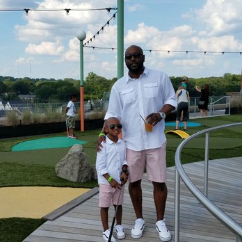 Skyline Park - Father & son playing mini golf - Amusement Parks Near Me - Atlanta, Georgia Skyline Park - Father & son playing mini golf - Amusement Parks Near Me - Atlanta, Georgia