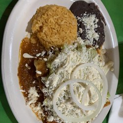 Morales Antojitos Mexicanos - Pollo enchiladas covered with red sauce (moderate spice level) in homemade tortillas with Spanish rice and refried black beans $12.99