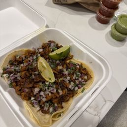 Pastor tacos, loaded with meat and double tortilla