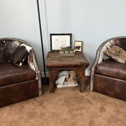 Santa Fe Terra Western Furniture - Beautiful cowhide swivel rockers for the main suite.