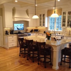 Gallery of Kitchens & Baths - Kitchen project completed 2011 and still looking great. Note: TV located behind stove top. Fantastic and unique idea from Matt