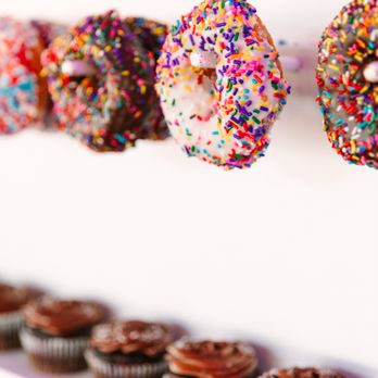 Sweet Traders - a row of cupcakes with sprinkles - Bakeries Near Me - Huntington Beach, California Sweet Traders - a row of cupcakes with sprinkles - Bakeries Near Me - Huntington Beach, California