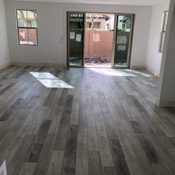 Creative Floors - a living room with wood floors - General Contractors Near Me Creative Floors - a living room with wood floors - General Contractors Near Me