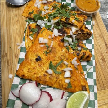 Tacos Madre - Hugs quesabirria- not pictured the cup of consomé for dipping. - Mexican Near Me - Costa Mesa, California