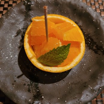 Sushi Den - Orange + mint at the end of the meal - Japanese Near Me - Denver, Colorado Sushi Den - Orange + mint at the end of the meal - Japanese Near Me - Denver, Colorado