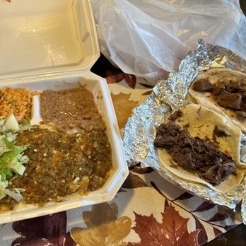 El Charrito - 3 enchiladas, rice and beans with ranchero sauce and guac. One Barbacoa taco and one carne taco - Mexican Near Me - Georgetown, Texas