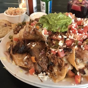 Casa Latina - Nachos with Carnitas added! (Tasty sangria pictured in background) - Mexican Near Me - Berkeley, California