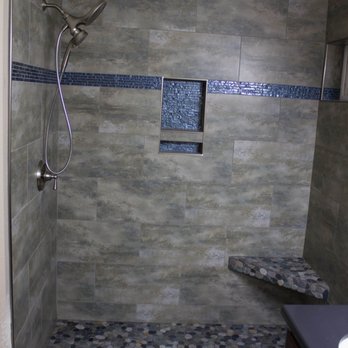 Crawfords Tile - a walk in shower with a bench - General Contractors Near Me - Citrus Heights, California
