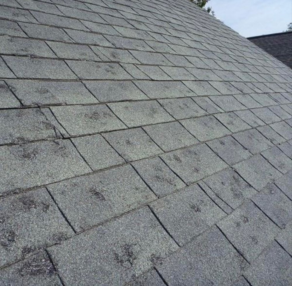Slide of A Low Cost Roofing Dallas