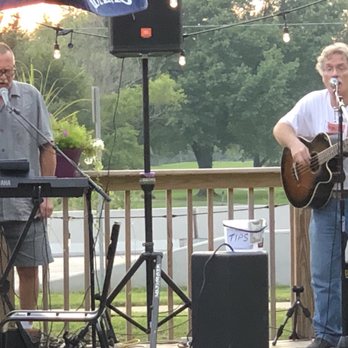 Treehouse Pub & Eatery - Sexist "band" on the lovely patio - Pizza Near Me - Bettendorf, Iowa