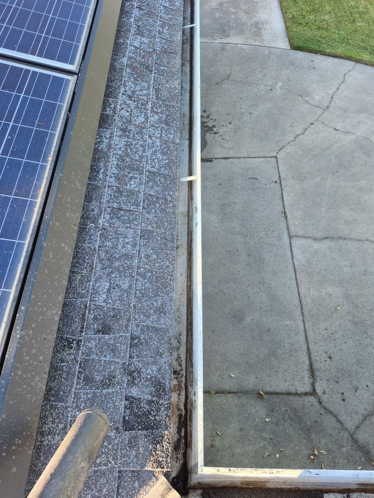 Slide of Cleaning Gutters Service