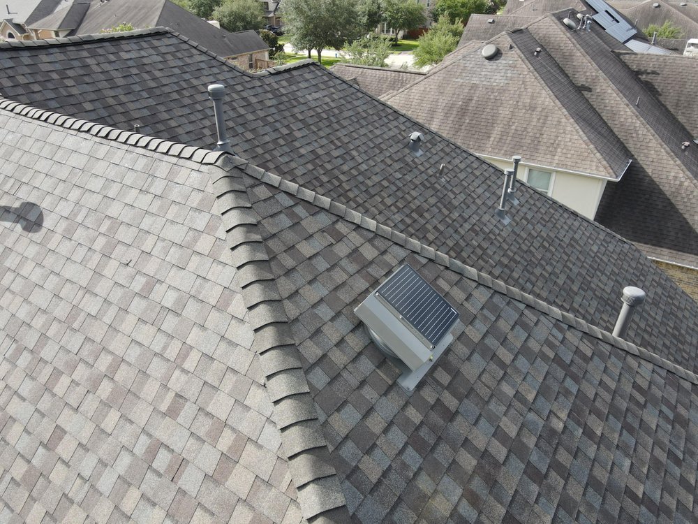 Slide of Core Four Roofing