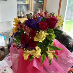 Safeway - Ready made bouquet included: two types of roses, sunflower and two colors of Alstroemeria