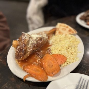 Troy's Greek Restaurant - Braised Lamb Shank - Greek Near Me - San Diego, California Troy's Greek Restaurant - Braised Lamb Shank - Greek Near Me - San Diego, California