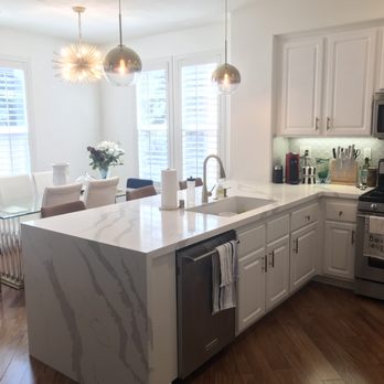 Renaissance Kitchens, Bath & Flooring - After remodeling: countertop, sink and backsplash - Flooring Near Me - Orange, California Renaissance Kitchens, Bath & Flooring - After remodeling: countertop, sink and backsplash - Flooring Near Me - Orange, California