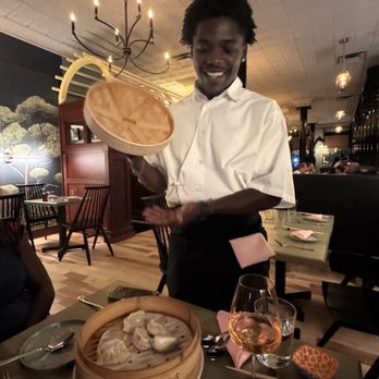 Rōmyō - Smiling Waitstaff and gyoza - Italian Near Me - Denver, Colorado
