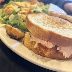 Mustard Seed Cafe - Connie's Bacon, Ham, Cheese and Caramel Apple Sandwich with Caesar salad