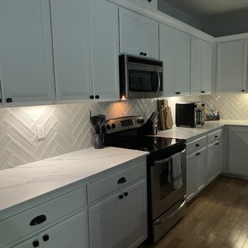 Prime Craft - Herringbone pattern with white textured tiles - Roofing Near Me Prime Craft - Herringbone pattern with white textured tiles - Roofing Near Me