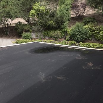 Ryder Roofing - The drain is at the highest point of the roof and water simply can't get to it to drain. - Roofing Near Me - Kelowna, British Columbia Ryder Roofing - The drain is at the highest point of the roof and water simply can't get to it to drain. - Roofing Near Me - Kelowna, British Columbia