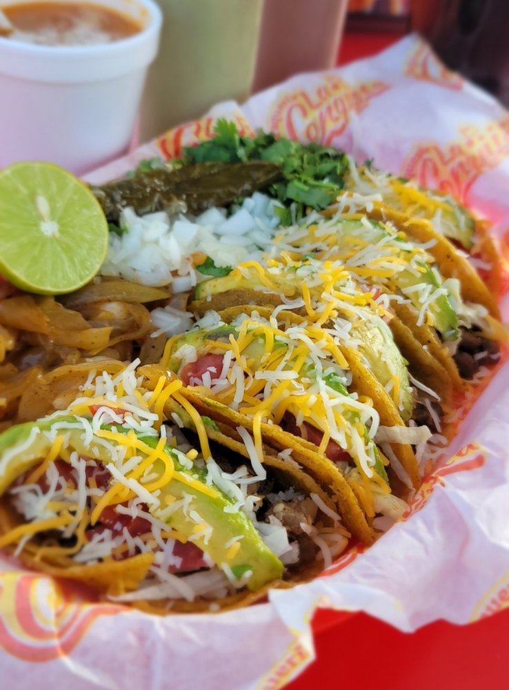 Taqueria La Conquista Logo
