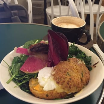 Cafe Madeline - Cheddar-chive biscuit bowl with sausage, eggs, spicy mayo and greens (kale and spinach). So good. - Breakfast & Brunch Near Me - Brooklyn, New York