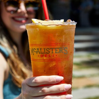 McAlister's Deli - a woman holding a drink - Salad Near Me - Nacogdoches, Texas McAlister's Deli - a woman holding a drink - Salad Near Me - Nacogdoches, Texas