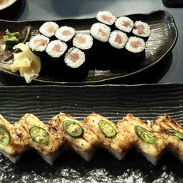 Tuna rolls and salmon oshizushi Tuna rolls and salmon oshizushi