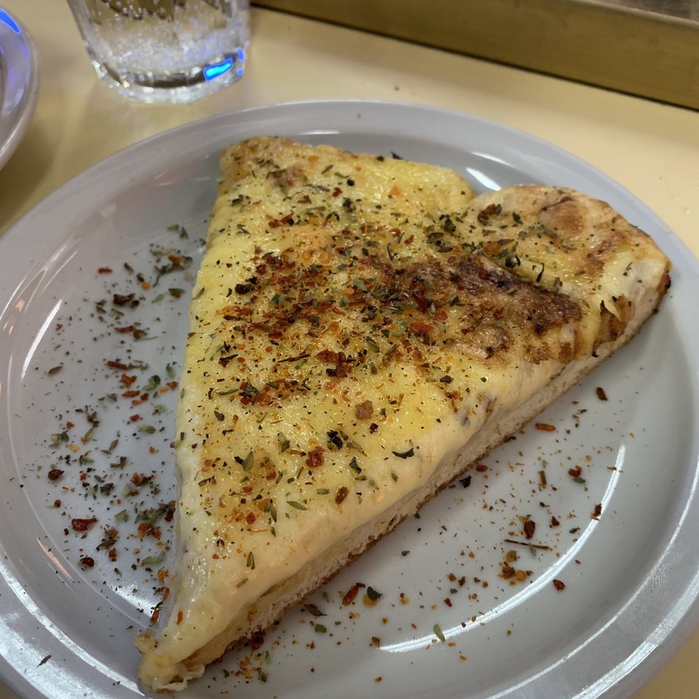 Güerrín - Mozzarella slice - Pizza Near Me - Buenos Aires, C Güerrín - Mozzarella slice - Pizza Near Me - Buenos Aires, C