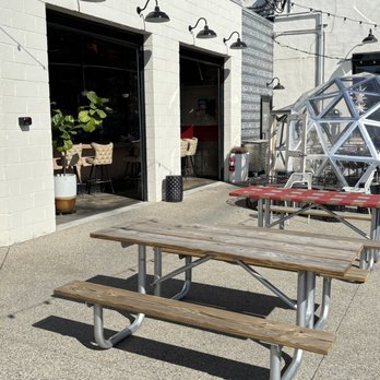 Honcho - Open garage doors that offer open air experience for bar and coffee shop - Latin American Near Me - Clarkston, Michigan