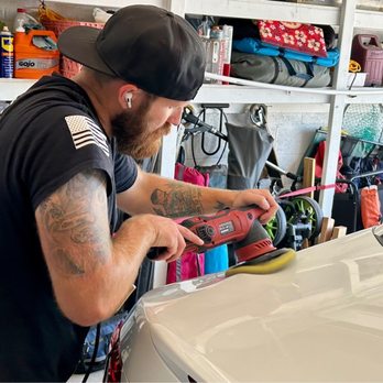 Kings Mobile Detail - Trent, the owner working meticulously. - Auto Detailing Near Me Kings Mobile Detail - Trent, the owner working meticulously. - Auto Detailing Near Me