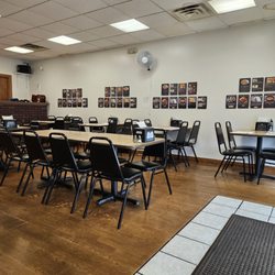 Busan Korean Restaurant - Ample space: Two large group tables and four tables along the wall, not included are two booths on the other side.