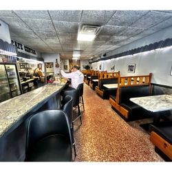 Cafe Central - Inside Central Cafe .1437 W Chicago Ave, Chicago, IL Puartoricann Food. New Owner & Menaegment. New Menu . Cool.