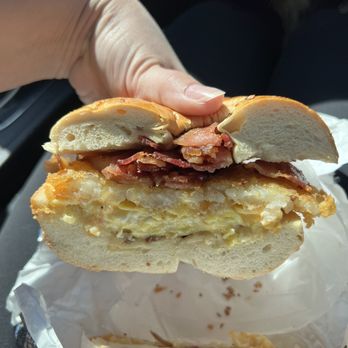 Shug's Bagels - The Shug (breakfast sandwich with hash browns, bacon egg & cheese) - Bagels Near Me - Dallas, Texas Shug's Bagels - The Shug (breakfast sandwich with hash browns, bacon egg & cheese) - Bagels Near Me - Dallas, Texas
