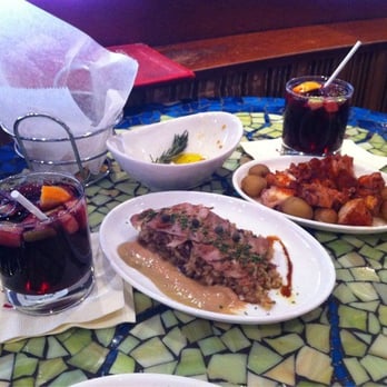 Jaleo - Octopus, duck confit wt rice, red sangria - Spanish Near Me - Washington, DC, District of Columbia Jaleo - Octopus, duck confit wt rice, red sangria - Spanish Near Me - Washington, DC, District of Columbia